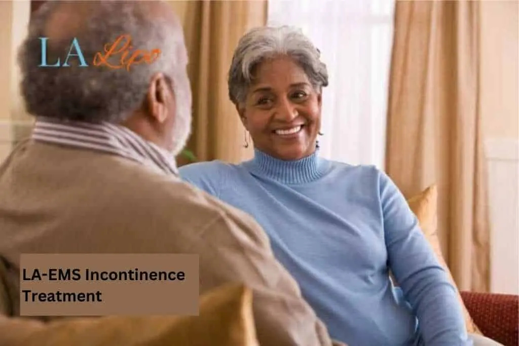 Couple sat smiling at each other - LA-EMS treatment Enfield Lock